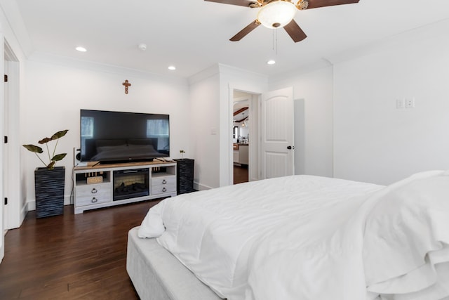 bedroom featuring dark wood-type flooring, recessed lighting, a ceiling fan, and crown molding