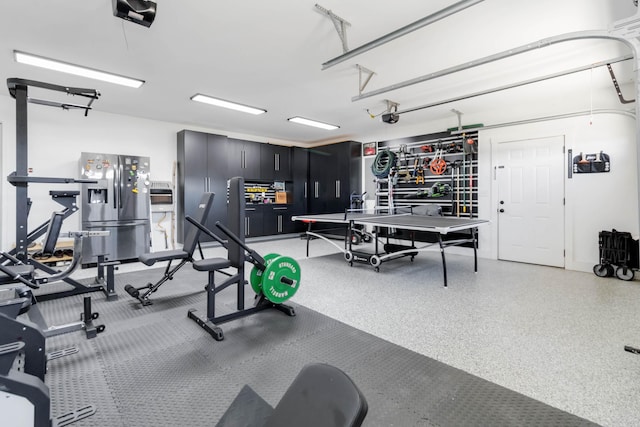 exercise room featuring a garage