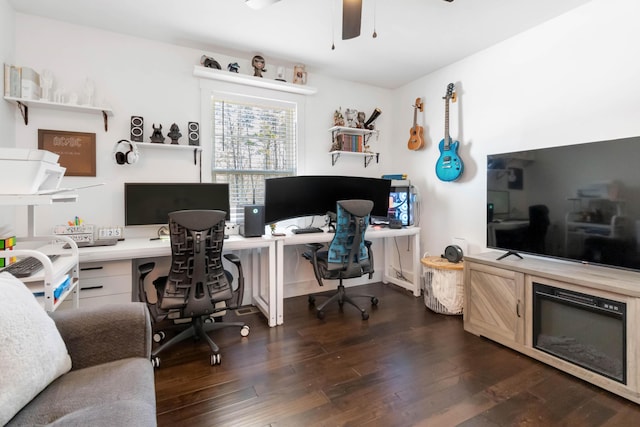 office area with ceiling fan and dark wood-style flooring