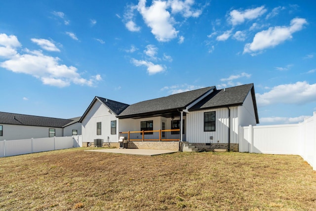 back of house with central AC unit, crawl space, a patio area, and a fenced backyard