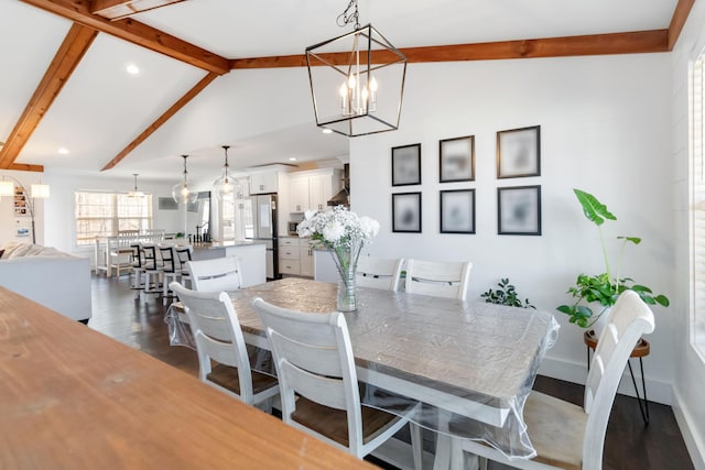 dining area featuring vaulted ceiling with beams, recessed lighting, an inviting chandelier, dark wood-type flooring, and baseboards