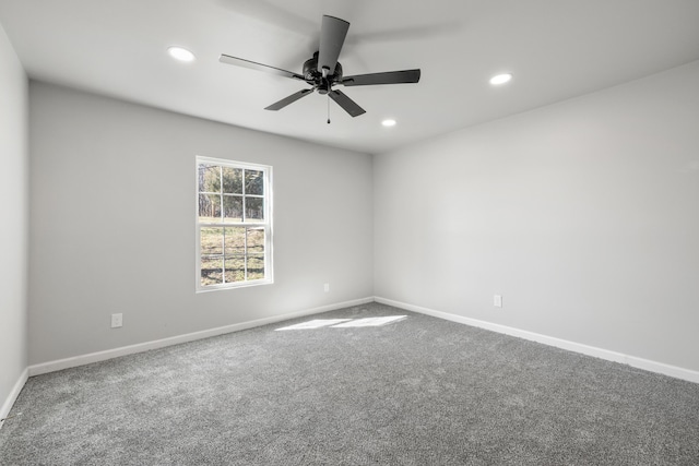 spare room featuring recessed lighting, carpet flooring, ceiling fan, and baseboards