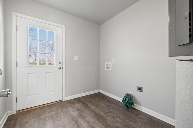 laundry area featuring hookup for an electric dryer, laundry area, baseboards, electric panel, and dark wood-style floors