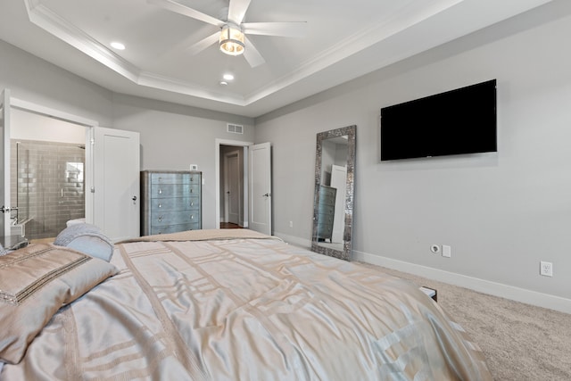 bedroom with carpet floors, recessed lighting, a raised ceiling, visible vents, and baseboards