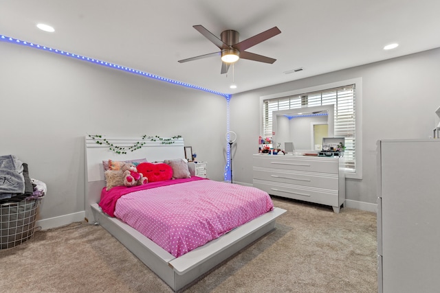 bedroom featuring light carpet, recessed lighting, visible vents, and baseboards