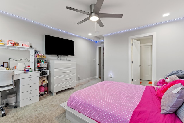 bedroom featuring light colored carpet and ceiling fan