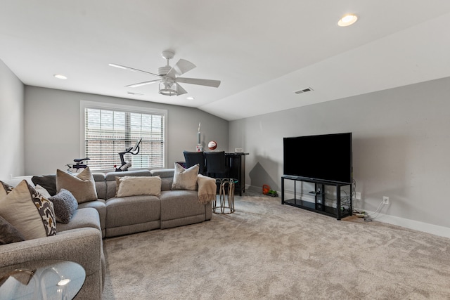 living area with lofted ceiling, visible vents, a ceiling fan, light carpet, and baseboards