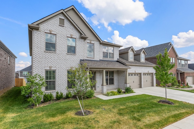 view of front facade featuring a front yard, brick siding, driveway, and an attached garage