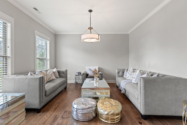 living room featuring ornamental molding, dark wood finished floors, visible vents, and baseboards