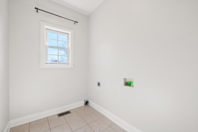 laundry area with visible vents, laundry area, hookup for a washing machine, light tile patterned flooring, and hookup for an electric dryer