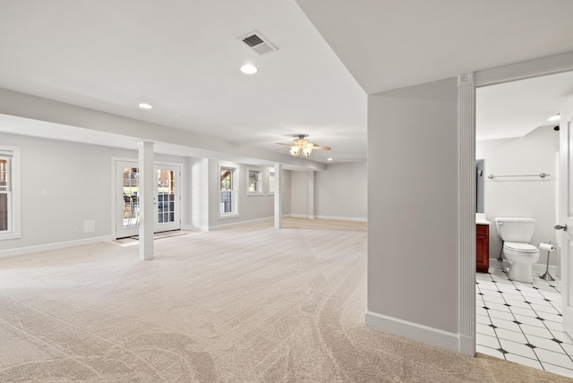 unfurnished living room with recessed lighting, visible vents, light colored carpet, and a ceiling fan