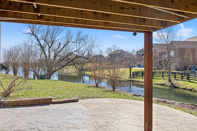 view of patio with a water view