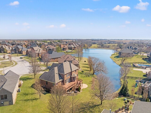 aerial view with a residential view and a water view