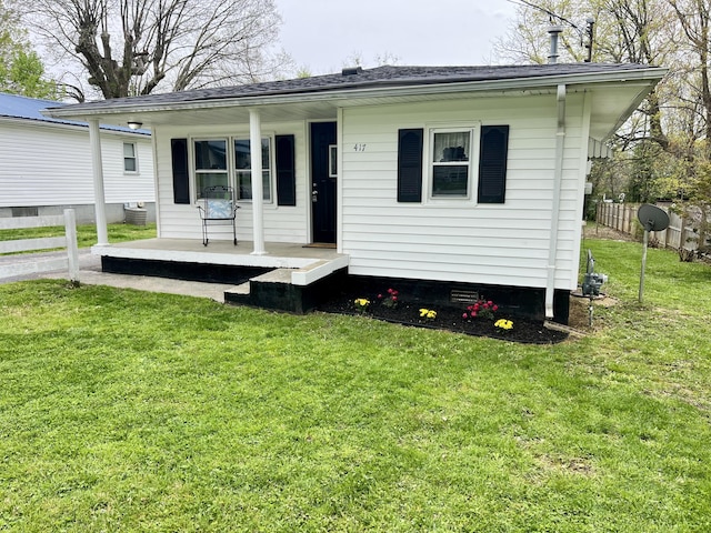 417 Harmon Hts, Stanford, KY 40484 - exterior space featuring a front yard, covered porch, and fence