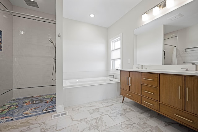 full bathroom featuring marble finish floor, double vanity, visible vents, a tile shower, and a bath