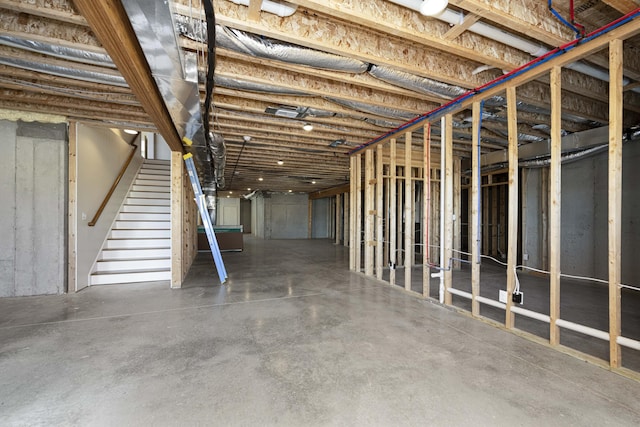 unfinished basement with stairs