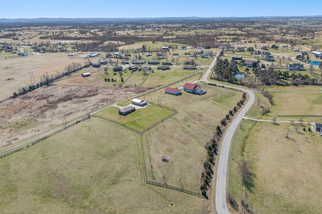 birds eye view of property featuring a rural view