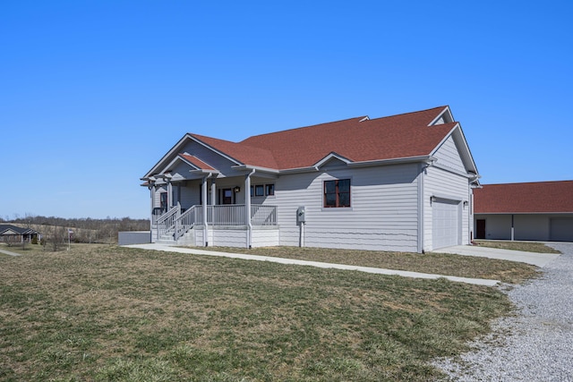 ranch-style home featuring a garage, a front yard, and concrete driveway