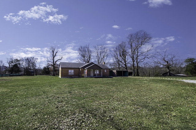 ranch-style house with a front yard
