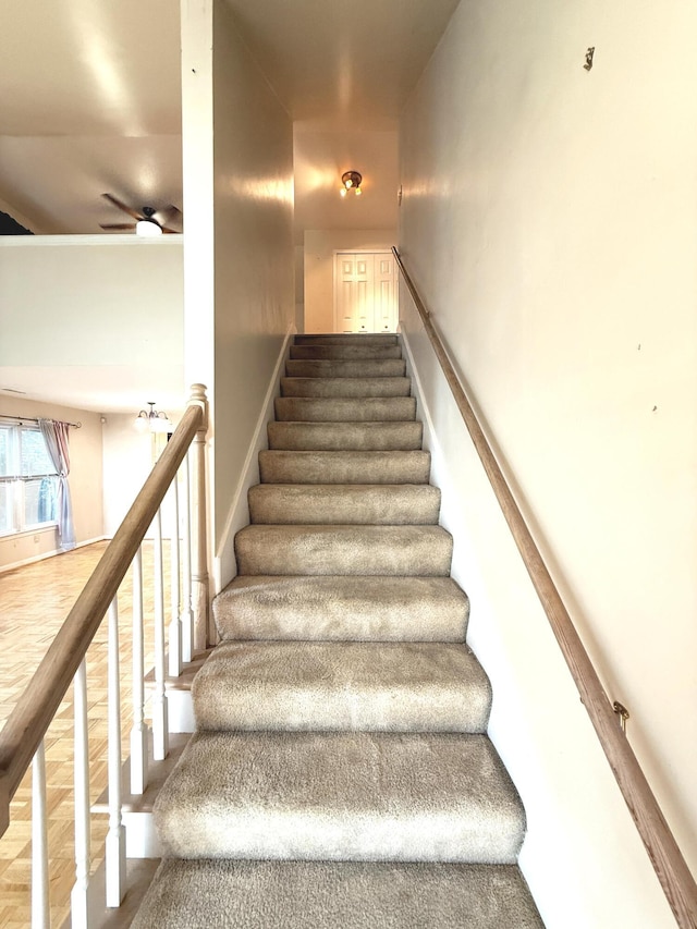 10509 Bay Pointe Ct, Louisville, KY 40241 - staircase featuring a ceiling fan and baseboards