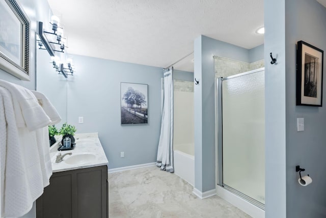 full bath featuring double vanity, curtained shower, a textured ceiling, and a sink