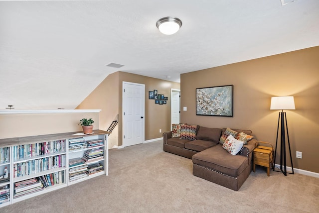 living room featuring light colored carpet, visible vents, and baseboards