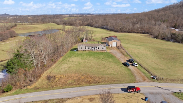 drone / aerial view with a rural view and a water view