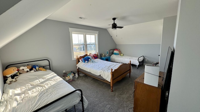 bedroom featuring carpet floors, visible vents, a ceiling fan, and lofted ceiling