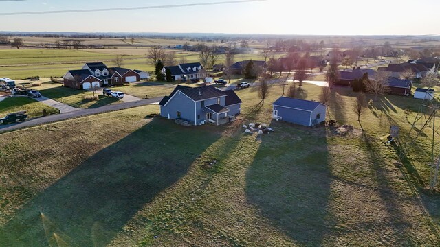 birds eye view of property with a residential view