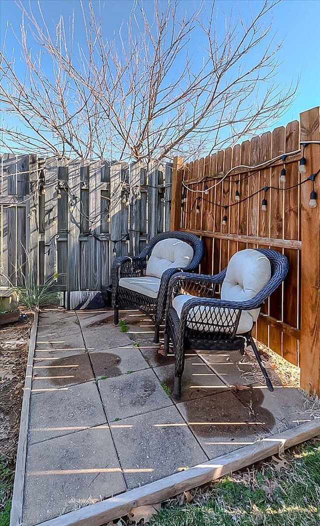 view of patio / terrace with fence