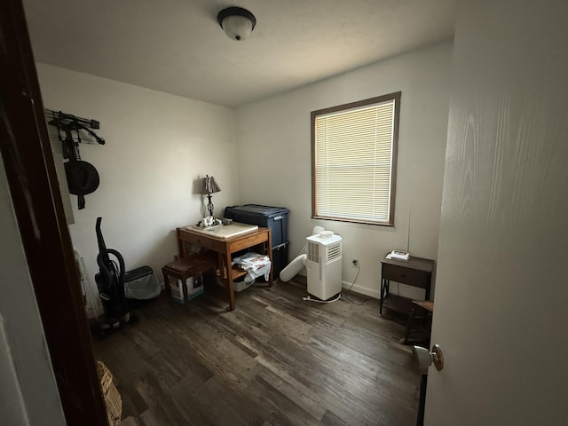 office featuring dark wood-style flooring and baseboards