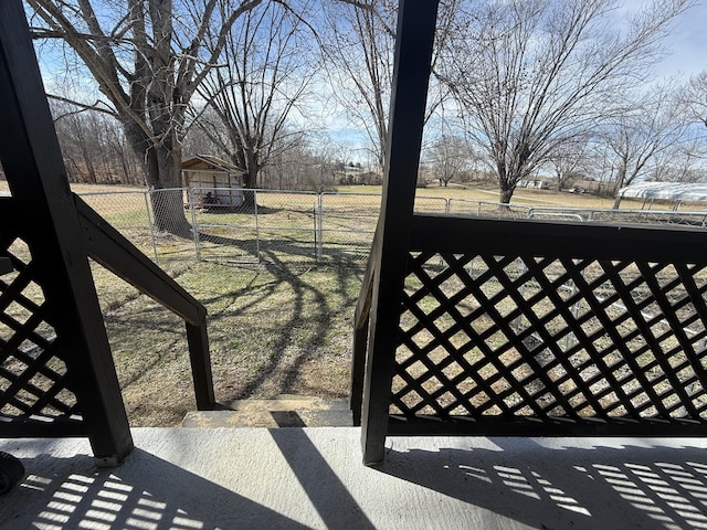 view of gate featuring fence