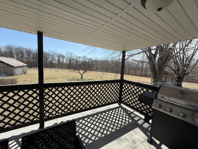 wooden deck featuring grilling area