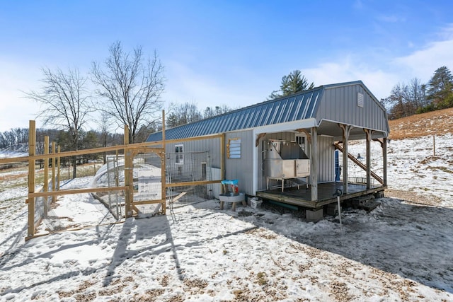 exterior space with an outbuilding