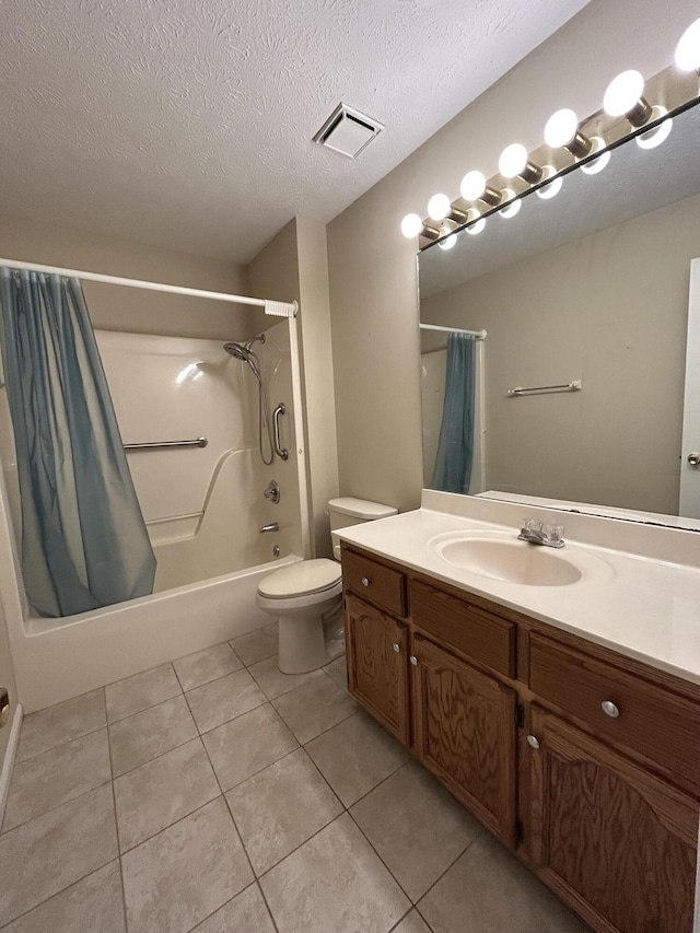 full bathroom featuring shower / tub combo with curtain, visible vents, toilet, a textured ceiling, and tile patterned floors