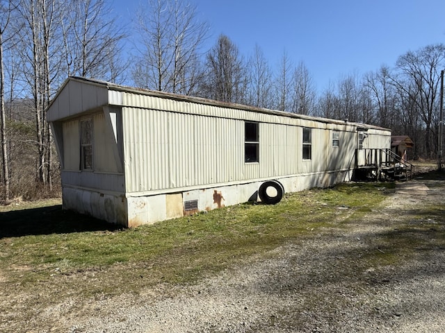 view of property exterior featuring crawl space