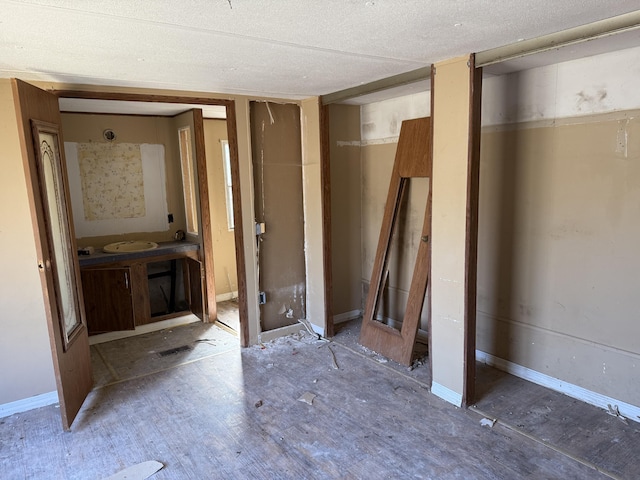 bathroom featuring baseboards