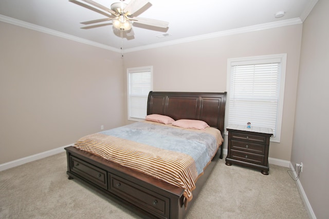 bedroom featuring light colored carpet, crown molding, visible vents, and baseboards