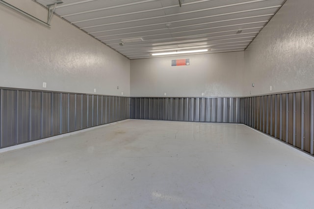 garage featuring a textured wall