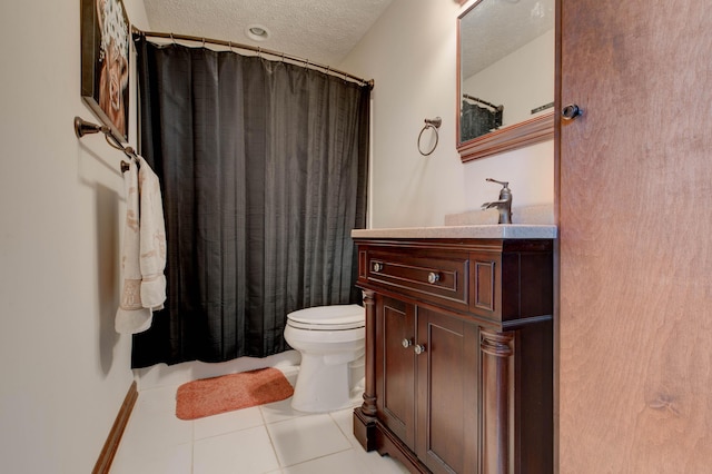 full bath with a shower with curtain, toilet, a textured ceiling, vanity, and tile patterned flooring