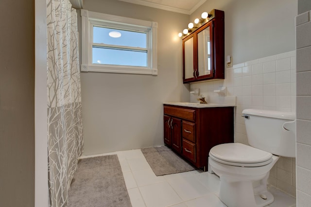 full bath with tile patterned flooring, toilet, vanity, tile walls, and crown molding