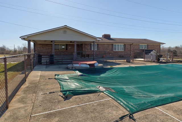 exterior space with ceiling fan, a patio, and fence