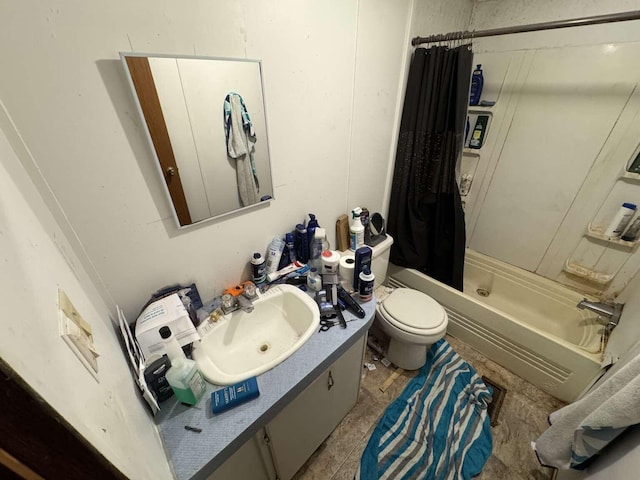 bathroom with toilet, shower / bath combo, and vanity