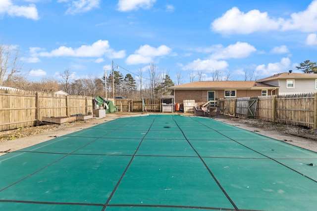 view of pool featuring a fenced backyard and a fenced in pool