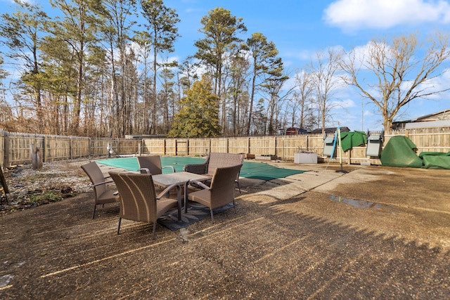 view of patio with a fenced backyard and a fenced in pool