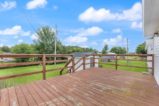 deck featuring a yard