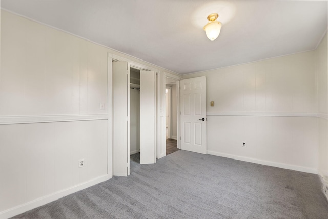 unfurnished bedroom featuring carpet