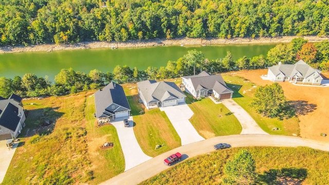 aerial view with a water view and a residential view