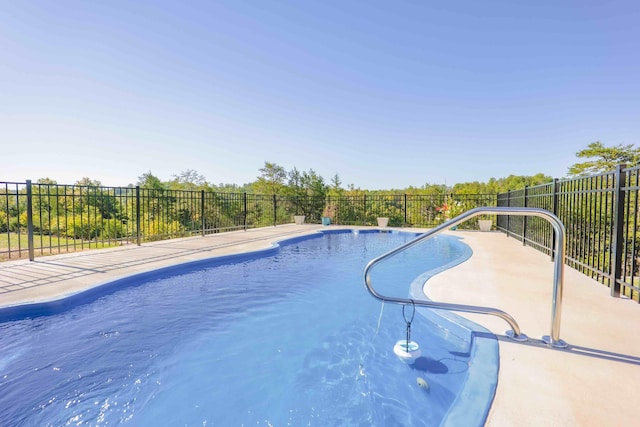 view of pool with fence and a fenced in pool