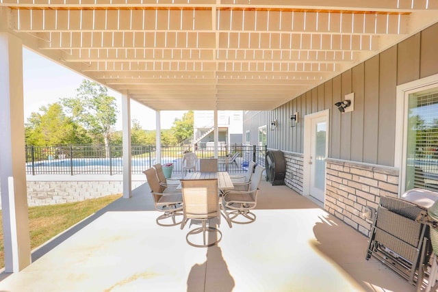 view of patio / terrace with fence and outdoor dining space